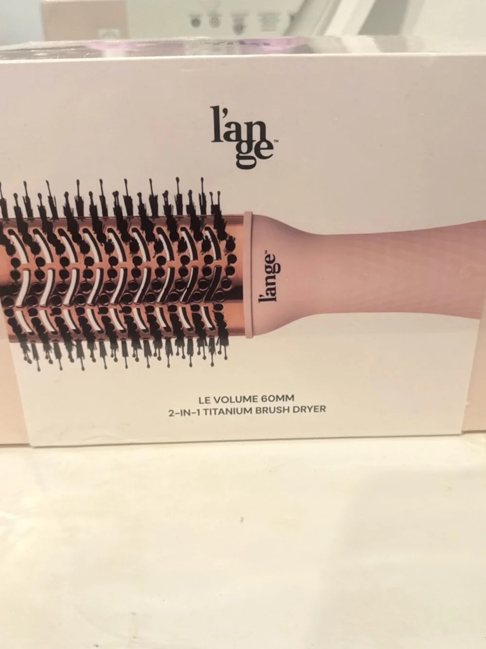 Lange 2-in-1 Titanium Brush Dryer in light pink and rose gold
